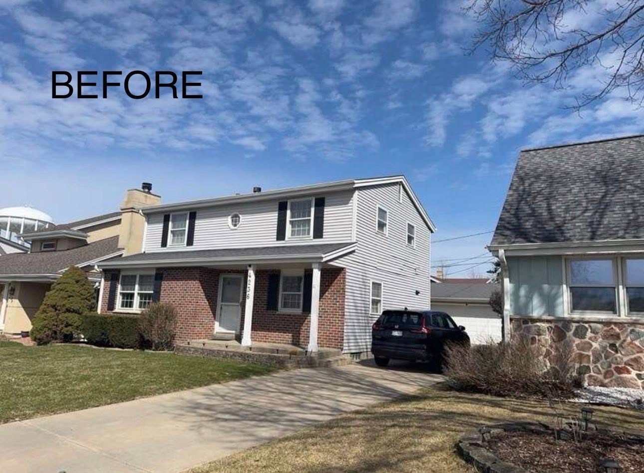 Home with old tan siding before Evergreen Exteriors
